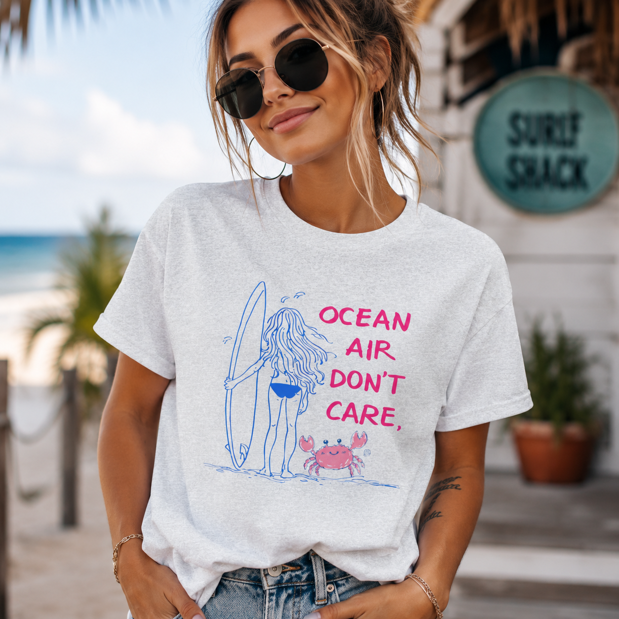 Ocean Air Don't Care Surf Girl T-Shirt | Beach Lover Graphic Tee | Coastal Summer Vacation Shirt | Cute Surfing Beach Graphic Gift for Women