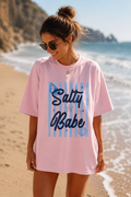 Salty Babe Beach Shirt | Coastal Graphic Tee | Oversized Summer T-Shirt | Cute Beach Vacation Shirt for Women | Seashell & Starfish Graphic